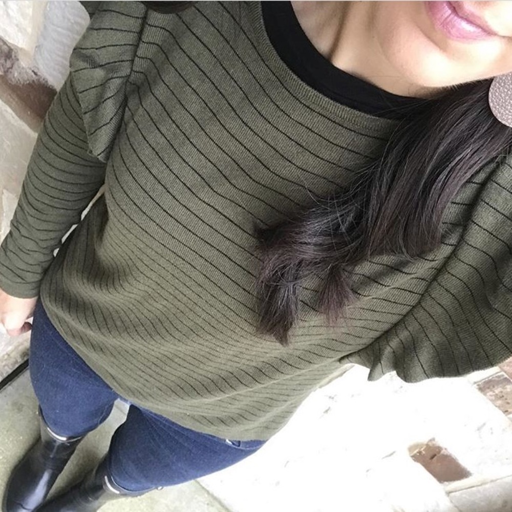 Green/black striped sweater